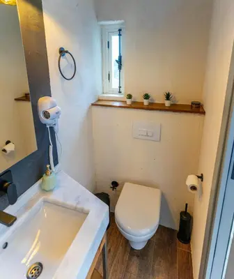 a bathroom with a toilet and a sink at Zalihe Boutique Hotel North Nicosia in Nicosia