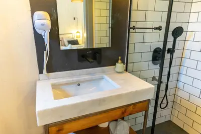 a bathroom with a sink and a mirror at Zalihe Boutique Hotel North Nicosia in Nicosia
