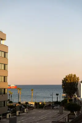a view of the ocean from a building at Old Port Hotel in Limassol