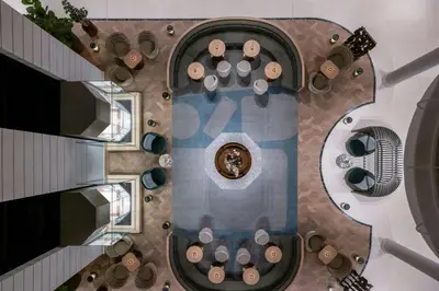 an overhead view of a building with a fountain at The Landmark Nicosia, Autograph Collection in Nicosia