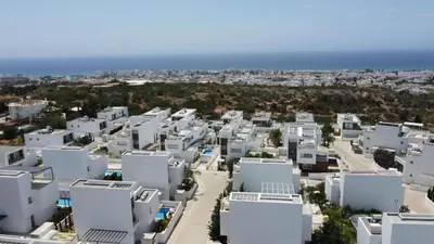 an aerial view of a city with white buildings at TooCoool Villa - Elite Sea Breeze in Ayia Napa