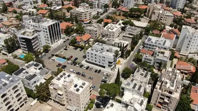 an overhead view of a city with tall buildings at Alaya Residence in Nicosia