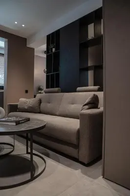 a living room with a couch and a table at Dest Retreat Beach & City Apt in Limassol