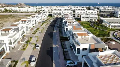 an aerial view of a street with white buildings at Four seasons sitesi in Aglantzia