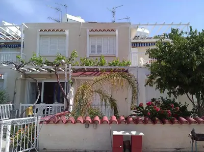 a house with plants on the top of it at Quiet Top Floor One Bedroom Apartment in Pyla Near Beach in Voroklini
