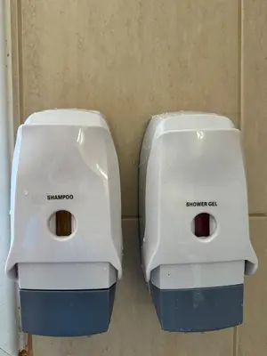 two white toasters sitting next to each other at Majestic Gardens 10 minutes from Larnaka Airport in Tersephanou