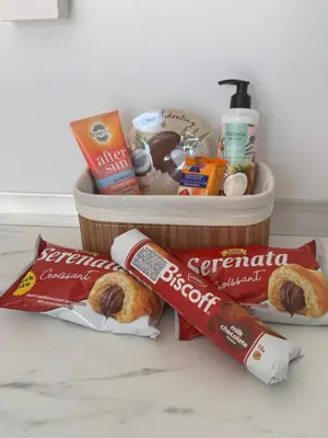 a basket filled with food and other snacks at Sunflight Apt 01B One Bedroom Apt in Larnaka