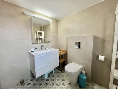 a bathroom with a sink and a toilet at STAY Perla House in Protaras