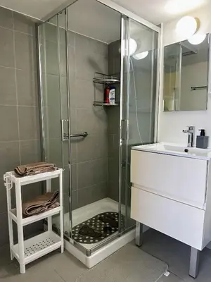 a bathroom with a shower and a sink at Seaview Apartment in Limassol in Limassol