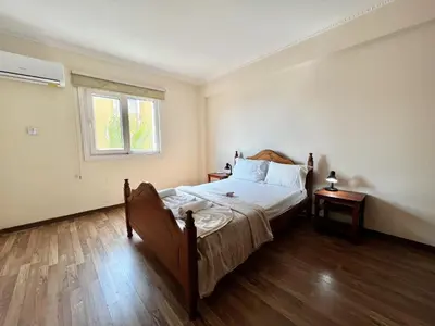 a bedroom with a bed and a window at STAY Napa Oniro Apartment in Ayia Napa