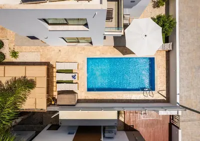 an aerial view of a house with a swimming pool at Levanda Dreams 8 in Paralimni