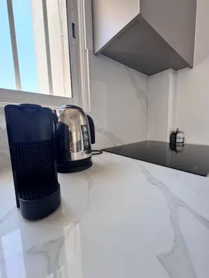 a toaster sitting on a counter in a kitchen at Dhekelia Beach house - Pyla, Larnaca in Pyla