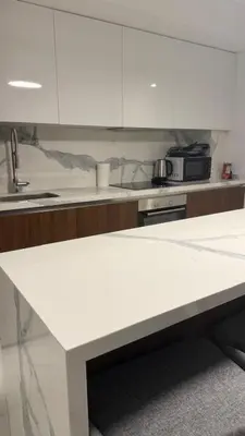 a kitchen with a white counter top and a sink at Grand Sapphire 22 floor B BLock 377, Cypr Północny in Paralimni