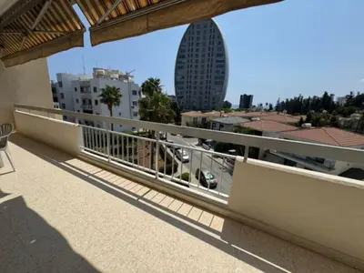a balcony with a view of a city at Sfina Sea view apartment by Ezoria villas in Limassol