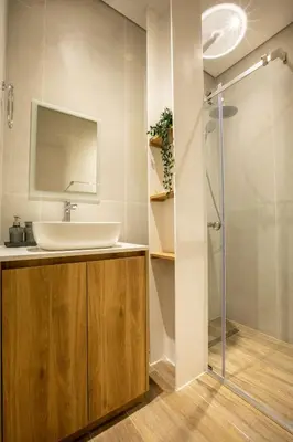 a bathroom with a sink and a shower at Irinis 150 Urban Luxury Studios in Limassol