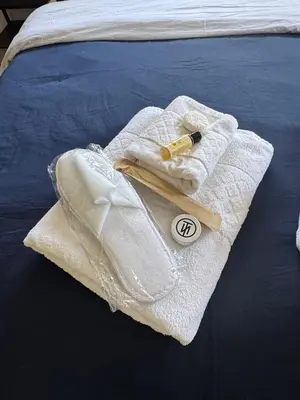 a pair of towels sitting on a bed at Elegant Escape in Nicosia in Nicosia