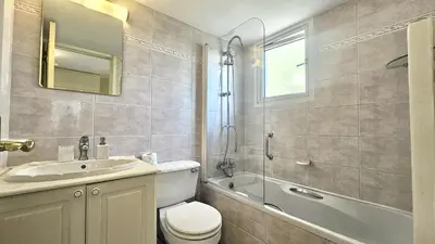 a bathroom with a toilet and a sink and a shower at STAY Charm Classic Apartment in Strovolos