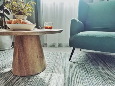 a table with a bowl of food and a glass at Grace Living in Limassol