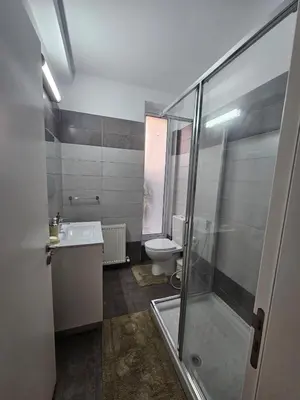 a bathroom with a toilet and a sink and a shower at 3 bedroom villa in Voroklini