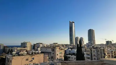 a view of a city with tall buildings at City center beach and supermarket walking distance in Limassol