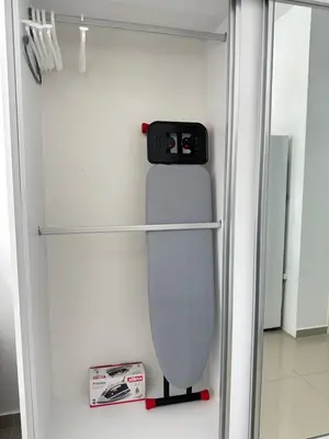 a skateboard in a refrigerator with a clock on it at Long Beach İskele - Caesar Resort Studio , Near Famagusta in Paralimni