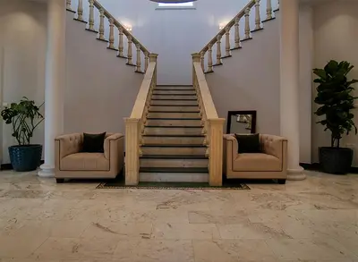 a stair case with two chairs and a staircase at Cyprus Sunbay Retreat in Ayia Napa