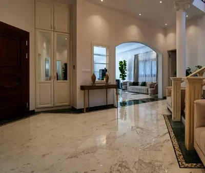 a large living room with a stone floor at Cyprus Sunbay Retreat in Ayia Napa