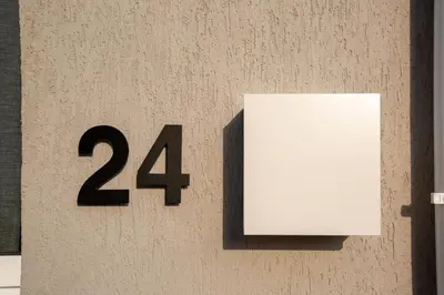 a sign with the number on a wall at Two Bedroom House In Town Center by Sweet Keys in Limassol