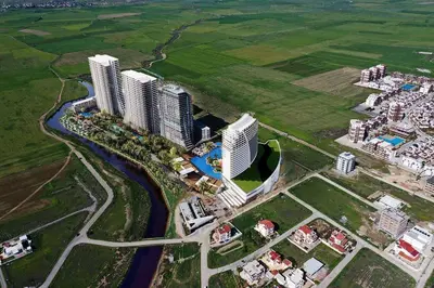 an aerial view of a city with tall buildings at Grand Sappfıre Resort Iskele in Larnaka