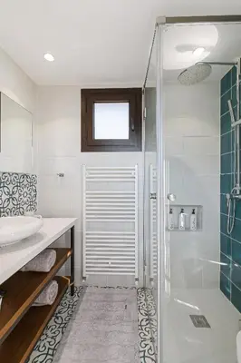 a bathroom with a shower and a sink at Horizon View Lefkara with Pool, Garden, Parking in Pano Lefkara