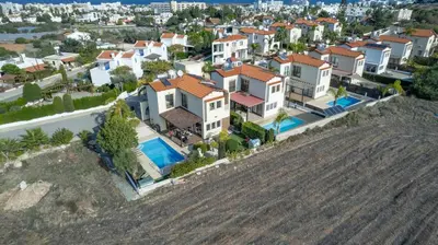 an aerial view of a house with a swimming pool at Sunnyside Family Villa in Protaras