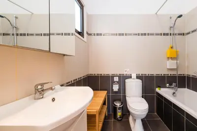 a bathroom with a sink and a toilet at Sunnyside Family Villa in Protaras