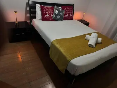 a bedroom with a bed with two towels on it at Mountain Retreat in Kakopetria, Cyprus - Perfect for Families in Kakopetria