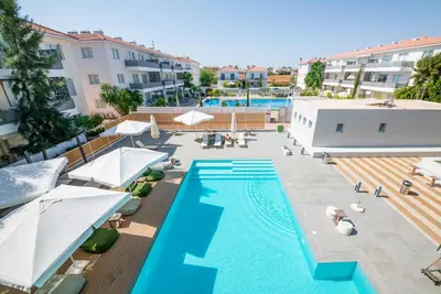 an overhead view of a swimming pool at a hotel at Mythical Sands 2 - G in Aglantzia