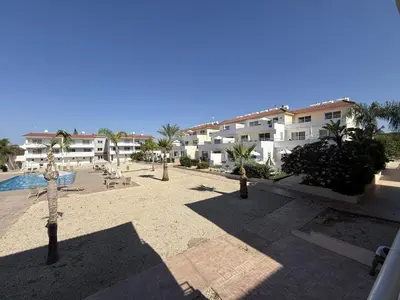 a view of a resort with a pool and buildings at Nissi 3, 1 -B in Ayia Napa