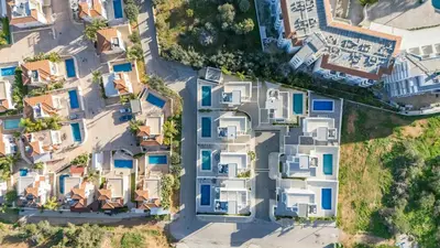 an aerial view of a group of houses at Green Bay Villa #12 in Protaras