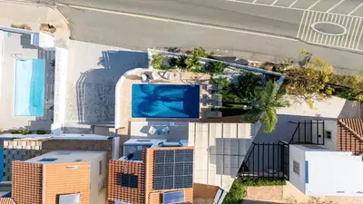 an overhead view of a building with a swimming pool at Blue Horizon Villa in Protaras