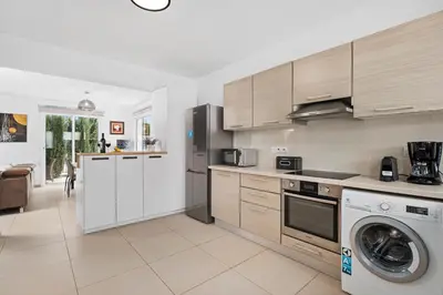 a kitchen with a washer and a dishwasher at Villa Anais - 3-Bed Villa with Private Pool in Paralimni