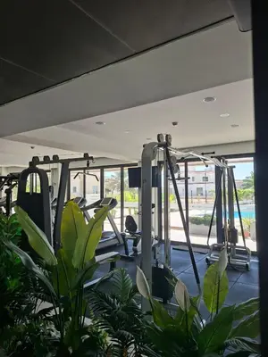 a gym with rows of treadmills at Panorama Comfort Suita in Protaras