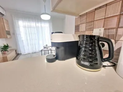 a black coffee pot sitting on a counter in a kitchen at 1, bed Kapparis, Triumph 1 - A in Paralimni