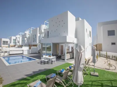 an external view of a villa with a swimming pool at Holiday Home Bleu Vie in Protaras by Interhome in Protaras