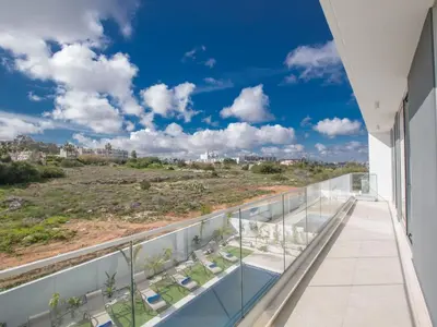 a balcony with a view of the desert at Holiday Home 3-Schlafzimmer-Villa mit privatem Pool im Zentrum by Interhome in Protaras