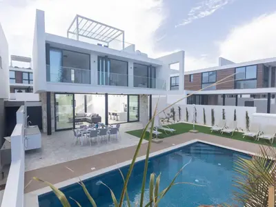 an image of a house with a swimming pool at Holiday Home Protaras Aqua Pearl Villa AQ05 by Interhome in Protaras
