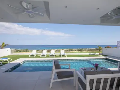 a swimming pool with a view of the ocean at Holiday Home Eleganter Urlaub Artizan Villa AR5 by Interhome in Protaras