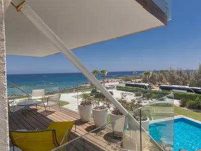 a balcony with a view of the ocean at Apartment Luxuriöse Wohnung am Strand von Thalassa by Interhome in Protaras