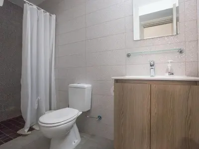 a bathroom with a toilet and a sink at Holiday Home Protaras - schönes Ferienhaus für 10 Personen by Interhome in Protaras