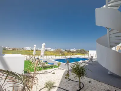 a view from the balcony of a house with a swimming pool at Holiday Home Ferienvilla Vie Bleu mit großem Pool by Interhome in Protaras