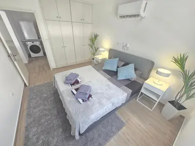 an aerial view of a bedroom with a bed in a room at 1 bedroom, Agia Napa 1 - C in Ayia Napa
