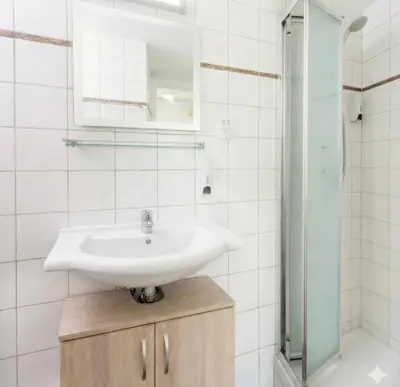 a bathroom with a sink and a shower at Fig Tree Beach Villa Six in Protaras