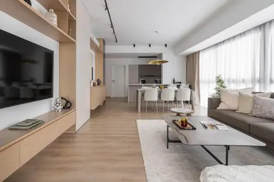 a living room with a couch and a table at Aoki 3-Bedroom Luxury Apartment in Limassol